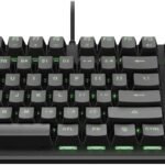 Gaming wired mechanical keyboard with green backlighting and a full set of keys, including a numeric keypad (brand logo on top-right).