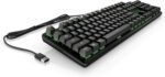 Angled view of a black mechanical keyboard with green backlighting and a USB plug.