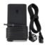 Black wall power adapter with a long coiled cord and detachable two-pin plug.