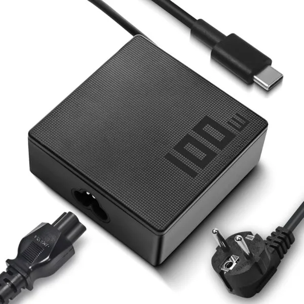 Black square power adapter with textured top and interchangeable plug heads for different outlets (EU/US/UK). It’s a compact charger with a visible 1000W marking on the surface.