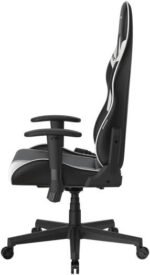 Ergonomic black and gray office chair with high back, adjustable armrests, and wheeled five-star base.