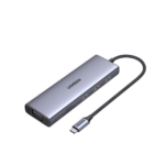 UGREEN USB-C hub with braided cable, offering VGA output and three USB-A ports (silver rectangular adapter). It connects to a laptop or device to expand ports. | Ahoundjuè Technologies UGREEN USB-C hub with braided cable, offering VGA output and three USB-A ports (silver rectangular adapter). It connects to a laptop or device to expand ports.