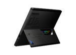 Black futuristic gaming laptop shown in tent/open stand mode, with a blue triangular logo on the front panel and a colorful screen visible through a side opening.