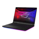 Gaming laptop open at a slight angle, with RGB keyboard and blue-pink underglow, displaying ROG Strix on the screen