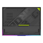 Back view of a gaming laptop with diagonal cooling vent panel and neon RGB edge lighting (purple, blue, pink, yellow)