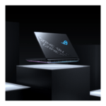 Stylized gaming laptop with blue ROG logo floating above a pedestal against a dark background