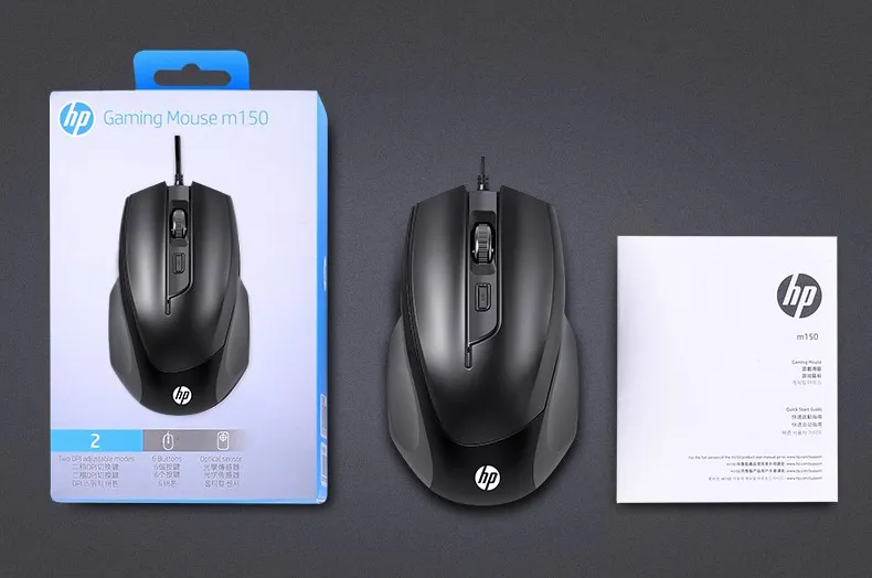 HP Gaming Mouse m150 packaging on the left, a black wired mouse in the center, and a white manual on the right. | Ahoundjuè Technologies HP Gaming Mouse m150 packaging on the left, a black wired mouse in the center, and a white manual on the right.