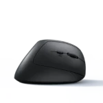 Close-up of a black computer mouse viewed from the side, showing the scroll wheel and left-click area on a light surface