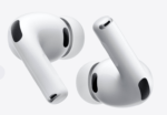 Pair of white wireless earbuds with black mesh grills, floating against a light gray background. | Ahoundjuè Technologies Pair of white wireless earbuds with black mesh grills, floating against a light gray background.