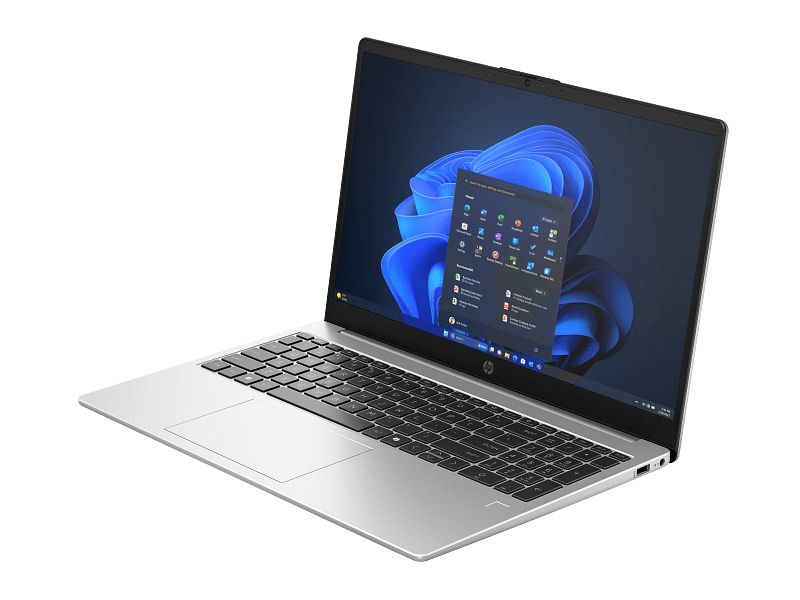 Silver HP laptop open at a slight angle, displaying a Windows desktop with app icons on the screen and a full keyboard area visible to the viewer.