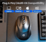HP mouse on a desk with promotional text 'Plug & Play | Multi-OS Compatibility' and icons labeled Laptop, Desktop, MAC, Windows | Ahoundjuè Technologies HP mouse on a desk with promotional text 'Plug & Play | Multi-OS Compatibility' and icons labeled Laptop, Desktop, MAC, Windows