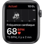 Watch screen showing current heart rate: 68 BPM with heart icon and a small graph, labeled in French as 'Fréquence cardiaque' and 'il y a 2 mn' at the bottom.