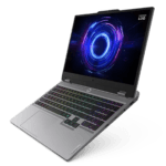 Lenovo gaming laptop open at an angle with a rainbow RGB keyboard and neon circular wallpaper on the screen