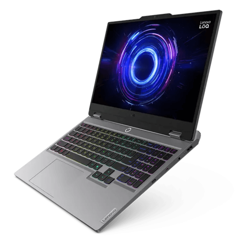 Lenovo gaming laptop open at an angle with a rainbow RGB keyboard and neon circular wallpaper on the screen