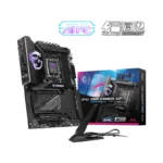 Gaming motherboard setup featuring a high-end black Z890 Carbon WiFi motherboard with boxed packaging and a monitor stand in front, emphasizing performance and connectivity logos (AIPC, Ultra Connect).
