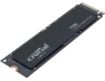Crucial T105 NVMe M.2 SSD laying on a dark PCB edge connector, labeled 'T105 PCIe Gen5 NVMe' (informational hardware component). | Ahoundjuè Technologies Crucial T105 NVMe M.2 SSD laying on a dark PCB edge connector, labeled 'T105 PCIe Gen5 NVMe' (informational hardware component).