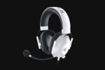 White and black over-ear gaming headset with attached microphone, on a black background; branding resembles Razer.