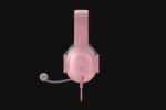 Pink over-ear gaming headset with attached mic against a black background; wired with pink cable and USB/3.5mm connector (brand logo visible)