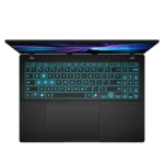 Top-down view of a black gaming laptop with cyan backlit keyboard and colorful screen on a black background.