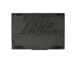 Back panel of a dark gaming laptop with diagonal vents and the slogan 'THIS IS TRUE GAMING'.