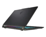 Gaming laptop open at an angle, showing an RGB-lit keyboard and a dark—scrolling lid with a logo shield.