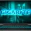 Open laptop displaying a glowing blue 'GIGABYTE' logo on a neon-lit blue background.