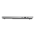 Closed silver laptop viewed from the side with visible USB port, SD card slot, and power/HDMI-style port on the right edge | Ahoundjuè Technologies Closed silver laptop viewed from the side with visible USB port, SD card slot, and power/HDMI-style port on the right edge