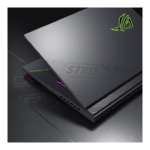 Close-up of a gray ASUS ROG Strix gaming laptop with a neon-green logo and pink backlit keyboard. | Ahoundjuè Technologies Close-up of a gray ASUS ROG Strix gaming laptop with a neon-green logo and pink backlit keyboard.