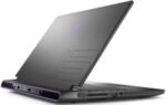 Angled black gaming laptop opened slightly, viewed from back-right with a purple-lit logo on the lid.
